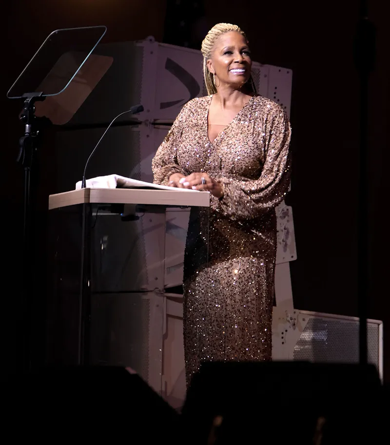 Vivian Scott Chew Standing At A Podium